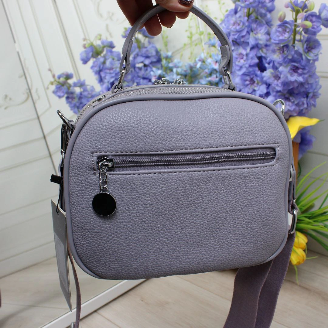 Фіолетова крос-боді: Аксесуар, що надихає на творчість та любов